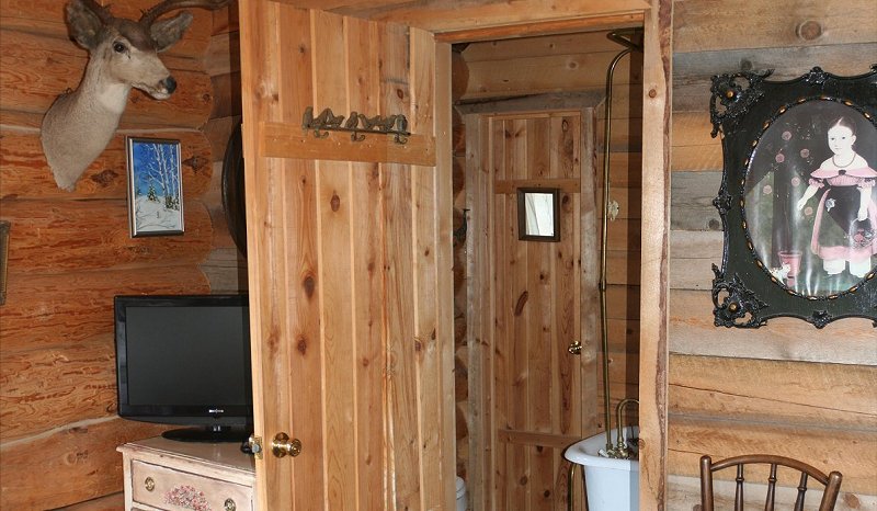 master bathroom with claw tub